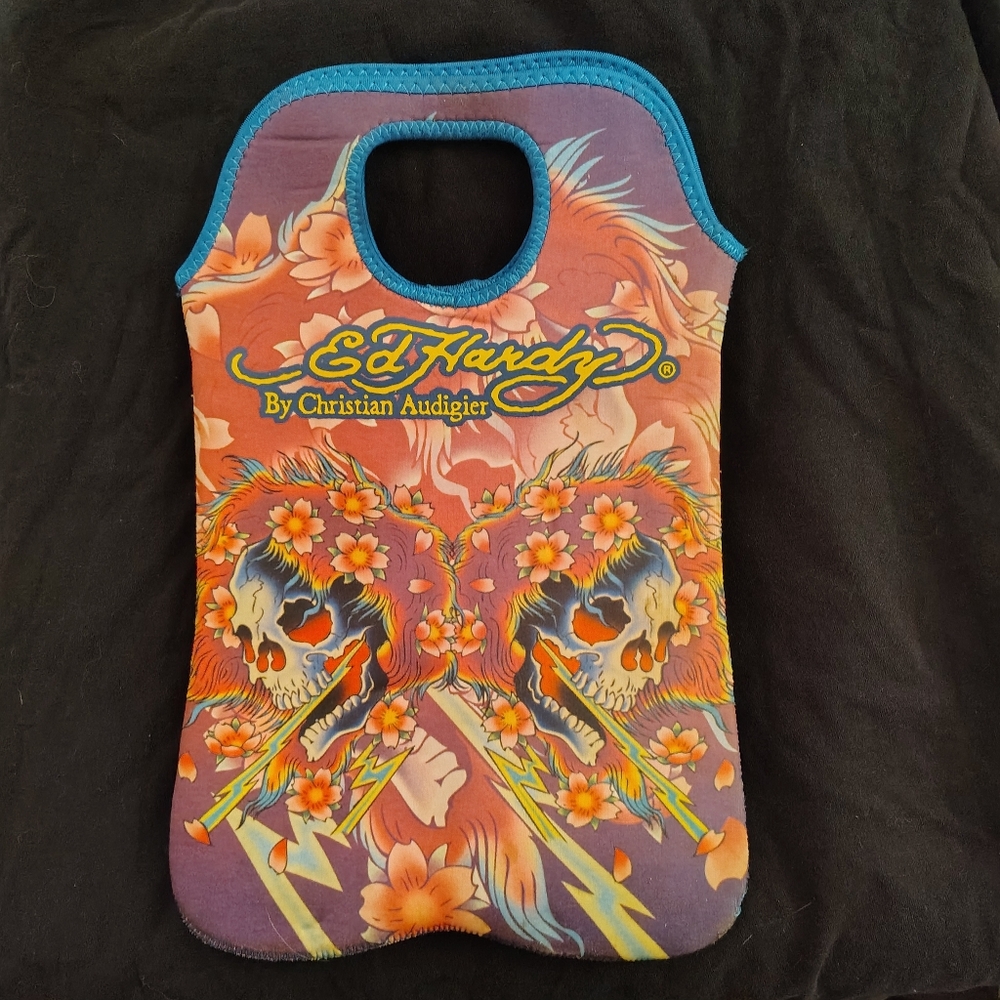 Ed Hardy Skulls and Lightening cloth bag. Nice thick wetsuit type material.